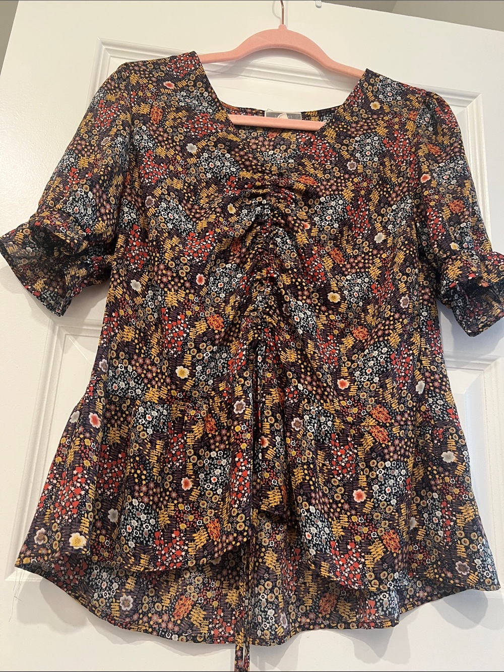 Pleione Black Multi Floral Ruched Peplum Top